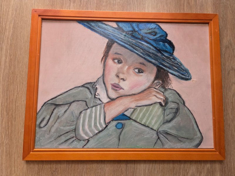 Dziewczynka w niebieskim kapeluszu